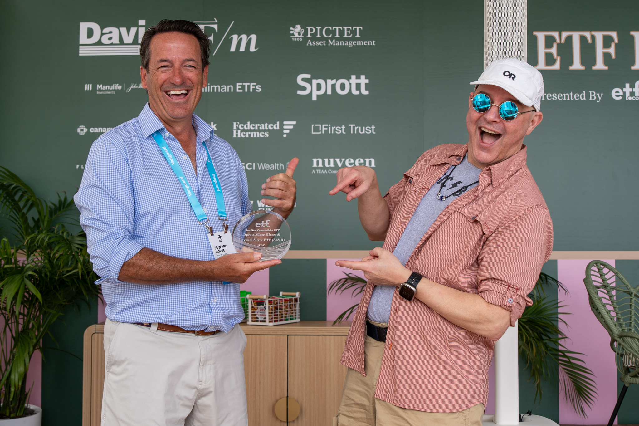 Ed Coyne and Dave Nadig smile as Ed holds the award for Best New Commodities ETF.