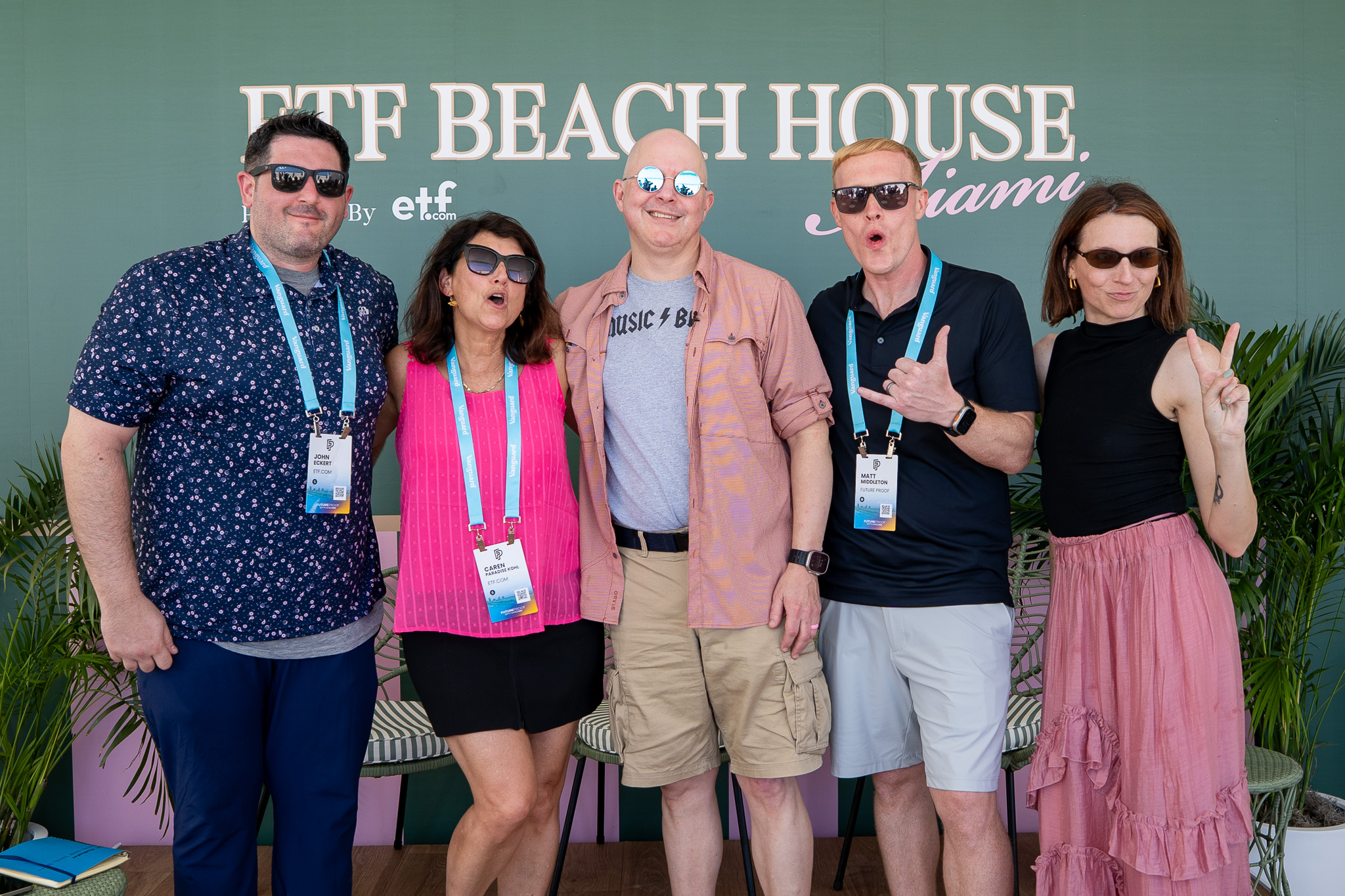 The ETF.com crew poses in front of the ETF Beach House sign.