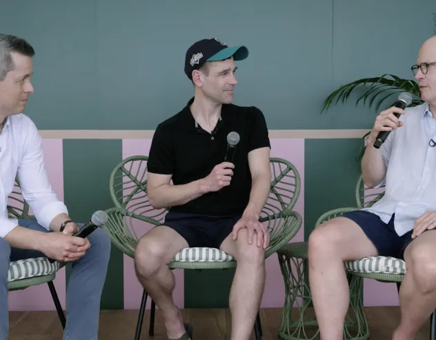 Brent Sullivan, Steven Curley, and Andrew Beer talk on-stage at the ETF Beach House