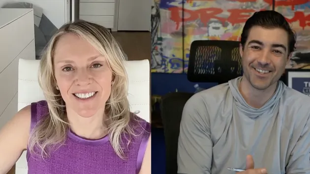 Sylvia Jablonski and Brad Roth laugh while talking