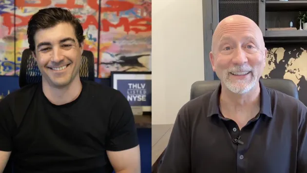 Brad Roth and Keith Fitz-Gerald smile while talking