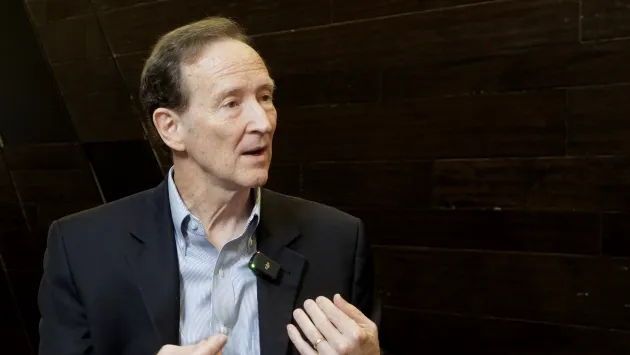 John Montgomery gestures while talking at ICI 2026 ETF Conference