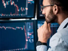 TLT Volatile as Investors Weigh Revised GDP, PCE Report Investor Analyzing Chart Data