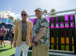 Bob Pisani and Dave Nadig smile in front of a Future Proof vignette