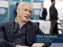 Matt Kaufman of Calamos sitting in a chair talking at Schwab IMPACT 2025