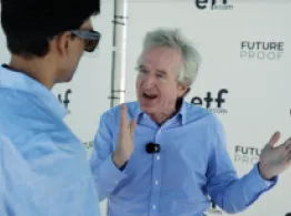Chris Davis gestures while talking with Sumit Roy