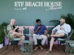 Dave Nadig, Sumit Roy, and Conor MacWilliams smile while talking on stage