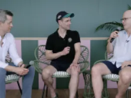Brent Sullivan, Steven Curley, and Andrew Beer talk on-stage at the ETF Beach House