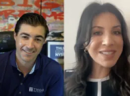 Eva Ados and Brad Roth smile while talking